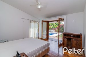 Casa em Condomínio à venda com 435m², 4 dormitórios, 3 suítes, 4 vagas, no bairro Terra Ville em PORTO ALEGRE