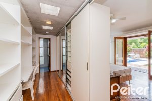 Casa em Condomínio à venda com 435m², 4 dormitórios, 3 suítes, 4 vagas, no bairro Terra Ville em PORTO ALEGRE