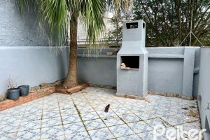 Casa à venda com 285m², 3 dormitórios, 2 vagas, no bairro Nonoai em Porto Alegre