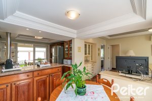 Casa à venda com 102m², 2 dormitórios, 2 suítes, 1 vaga, no bairro Ipanema em Porto Alegre