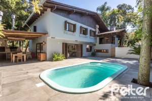 Casa em Condomínio à venda com 282m², 3 dormitórios, 1 suíte, 3 vagas, no bairro Cavalhada em PORTO ALEGRE