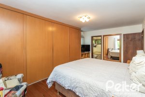 Casa em Condomínio à venda com 282m², 3 dormitórios, 1 suíte, 3 vagas, no bairro Cavalhada em PORTO ALEGRE