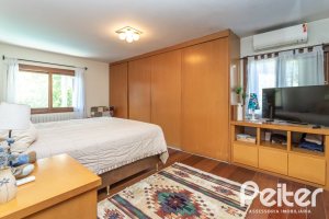 Casa em Condomínio à venda com 282m², 3 dormitórios, 1 suíte, 3 vagas, no bairro Cavalhada em PORTO ALEGRE