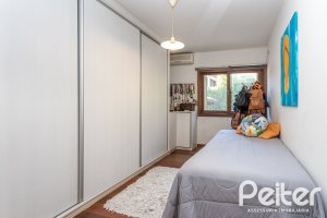 Casa em Condomínio à venda com 282m², 3 dormitórios, 1 suíte, 3 vagas, no bairro Cavalhada em PORTO ALEGRE