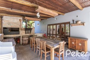 Casa em Condomínio à venda com 282m², 3 dormitórios, 1 suíte, 3 vagas, no bairro Cavalhada em PORTO ALEGRE