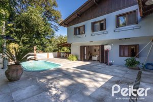 Casa em Condomínio à venda com 282m², 3 dormitórios, 1 suíte, 3 vagas, no bairro Cavalhada em PORTO ALEGRE