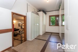 Casa em Condomínio à venda com 282m², 3 dormitórios, 1 suíte, 3 vagas, no bairro Cavalhada em PORTO ALEGRE