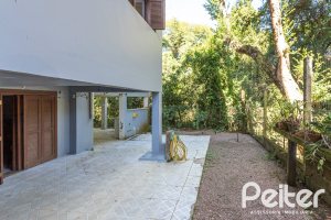 Casa em Condomínio à venda com 282m², 3 dormitórios, 1 suíte, 3 vagas, no bairro Cavalhada em PORTO ALEGRE