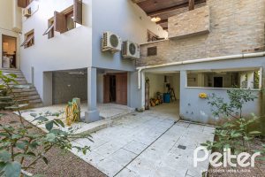 Casa em Condomínio à venda com 282m², 3 dormitórios, 1 suíte, 3 vagas, no bairro Cavalhada em PORTO ALEGRE