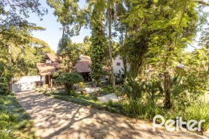 Casa em Condomínio à venda com 282m², 3 dormitórios, 1 suíte, 3 vagas, no bairro Cavalhada em PORTO ALEGRE