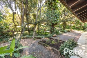 Casa em Condomínio à venda com 282m², 3 dormitórios, 1 suíte, 3 vagas, no bairro Cavalhada em PORTO ALEGRE