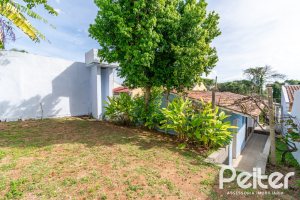 Casa à venda com 326m², 2 dormitórios, 1 suíte, 2 vagas, no bairro Ipanema em Porto Alegre