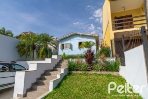 Casa à venda com 326m², 2 dormitórios, 1 suíte, 2 vagas, no bairro Ipanema em Porto Alegre