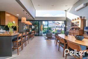 Casa em Condomínio à venda com 260m², 3 dormitórios, 3 suítes, 4 vagas, no bairro Alphaville em PORTO ALEGRE