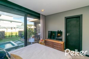 Casa em Condomínio à venda com 260m², 3 dormitórios, 3 suítes, 4 vagas, no bairro Alphaville em PORTO ALEGRE