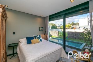 Casa em Condomínio à venda com 260m², 3 dormitórios, 3 suítes, 4 vagas, no bairro Alphaville em PORTO ALEGRE