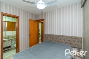 Casa em Condomínio à venda com 102m², 2 dormitórios, 1 suíte, 1 vaga, no bairro Guarujá em Porto Alegre