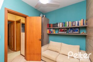 Casa em Condomínio à venda com 102m², 2 dormitórios, 1 suíte, 1 vaga, no bairro Guarujá em Porto Alegre