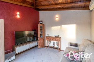 Casa em Condomínio à venda com 102m², 2 dormitórios, 1 suíte, 1 vaga, no bairro Guarujá em Porto Alegre