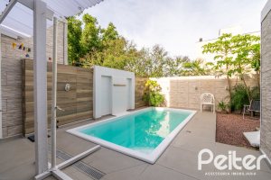 Casa à venda com 108m², 3 dormitórios, 2 suítes, 1 vaga, no bairro Hípica em Porto Alegre