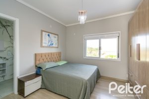 Casa à venda com 108m², 3 dormitórios, 2 suítes, 1 vaga, no bairro Hípica em Porto Alegre