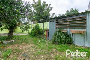 Casa à venda com 493m², 4 dormitórios, 1 suíte, 6 vagas, no bairro Ipanema em Porto Alegre