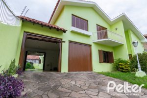 Casa à venda com 493m², 4 dormitórios, 1 suíte, 6 vagas, no bairro Ipanema em Porto Alegre