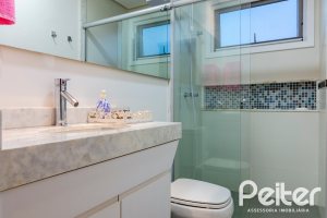 Casa em Condomínio à venda com 308m², 3 dormitórios, 3 suítes, 2 vagas, no bairro Alphaville em PORTO ALEGRE