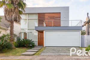 Casa em Condomínio à venda com 308m², 3 dormitórios, 3 suítes, 2 vagas, no bairro Alphaville em PORTO ALEGRE