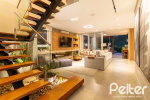 Casa em Condomínio à venda com 308m², 3 dormitórios, 3 suítes, 2 vagas, no bairro Alphaville em PORTO ALEGRE