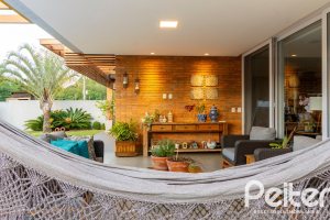 Casa em Condomínio à venda com 308m², 3 dormitórios, 3 suítes, 2 vagas, no bairro Alphaville em PORTO ALEGRE