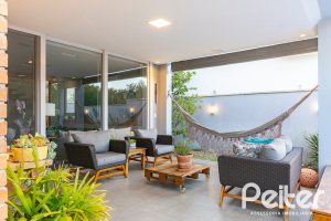 Casa em Condomínio à venda com 308m², 3 dormitórios, 3 suítes, 2 vagas, no bairro Alphaville em PORTO ALEGRE