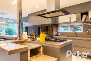 Casa em Condomínio à venda com 308m², 3 dormitórios, 3 suítes, 2 vagas, no bairro Alphaville em PORTO ALEGRE