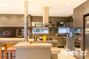 Casa em Condomínio à venda com 308m², 3 dormitórios, 3 suítes, 2 vagas, no bairro Alphaville em PORTO ALEGRE