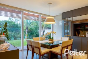 Casa em Condomínio à venda com 308m², 3 dormitórios, 3 suítes, 2 vagas, no bairro Alphaville em PORTO ALEGRE