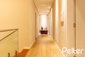 Casa em Condomínio à venda com 308m², 3 dormitórios, 3 suítes, 2 vagas, no bairro Alphaville em PORTO ALEGRE