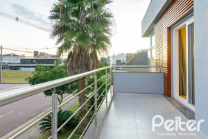 Casa em Condomínio à venda com 308m², 3 dormitórios, 3 suítes, 2 vagas, no bairro Alphaville em PORTO ALEGRE