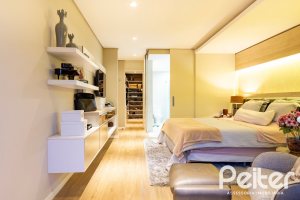 Casa em Condomínio à venda com 308m², 3 dormitórios, 3 suítes, 2 vagas, no bairro Alphaville em PORTO ALEGRE