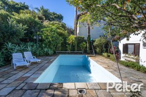 Casa em Condomínio à venda com 280m², 4 dormitórios, 2 suítes, 5 vagas, no bairro Cavalhada em PORTO ALEGRE