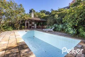 Casa em Condomínio à venda com 280m², 4 dormitórios, 2 suítes, 5 vagas, no bairro Cavalhada em PORTO ALEGRE