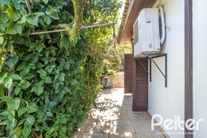 Casa em Condomínio à venda com 280m², 4 dormitórios, 2 suítes, 5 vagas, no bairro Cavalhada em PORTO ALEGRE