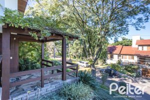 Casa em Condomínio à venda com 280m², 4 dormitórios, 2 suítes, 5 vagas, no bairro Cavalhada em PORTO ALEGRE