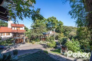 Casa em Condomínio à venda com 280m², 4 dormitórios, 2 suítes, 5 vagas, no bairro Cavalhada em PORTO ALEGRE