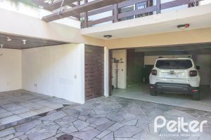 Casa em Condomínio à venda com 280m², 4 dormitórios, 2 suítes, 5 vagas, no bairro Cavalhada em PORTO ALEGRE