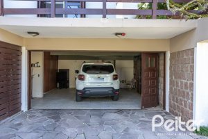 Casa em Condomínio à venda com 280m², 4 dormitórios, 2 suítes, 5 vagas, no bairro Cavalhada em PORTO ALEGRE