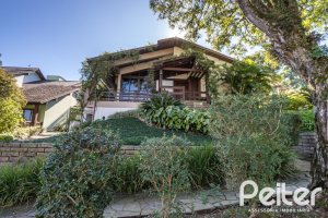 Casa em Condomínio à venda com 280m², 4 dormitórios, 2 suítes, 5 vagas, no bairro Cavalhada em PORTO ALEGRE