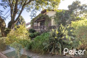 Casa em Condomínio à venda com 280m², 4 dormitórios, 2 suítes, 5 vagas, no bairro Cavalhada em PORTO ALEGRE