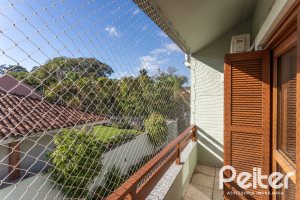 Casa em Condomínio à venda com 175m², 3 dormitórios, 1 suíte, 2 vagas, no bairro Jardim Isabel em Porto Alegre