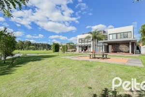 Casa em Condomínio à venda com 385m², 4 dormitórios, 4 suítes, 4 vagas, no bairro Terra Ville em PORTO ALEGRE