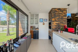 Casa em Condomínio à venda com 385m², 4 dormitórios, 4 suítes, 4 vagas, no bairro Terra Ville em PORTO ALEGRE